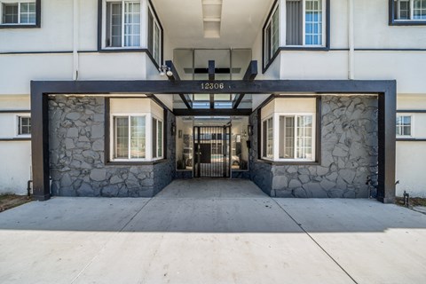 the entrance to a building with a revolving door